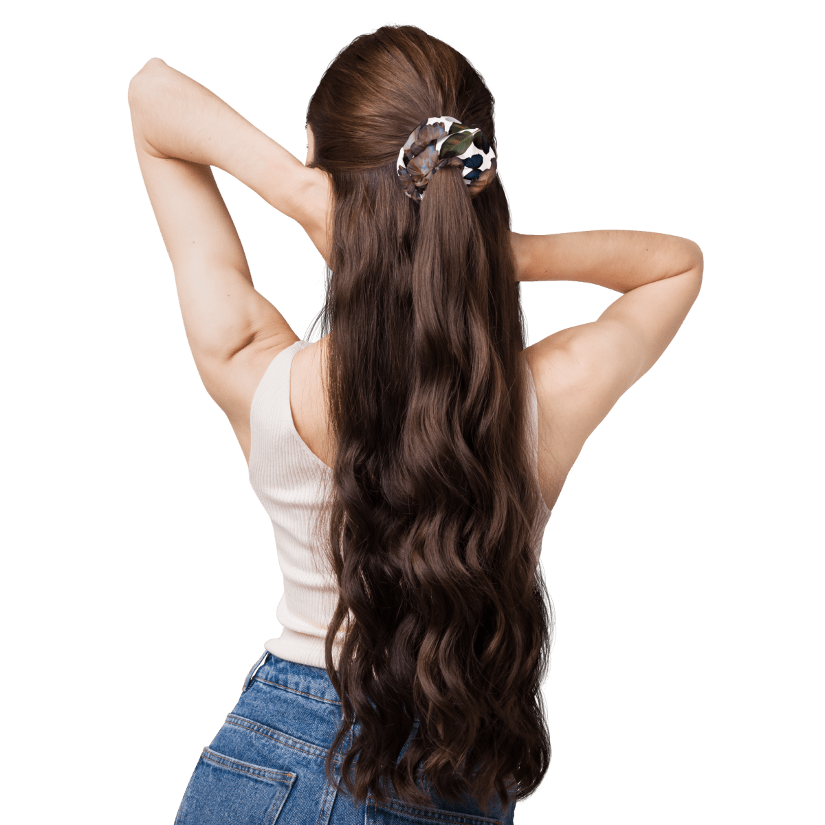 Dark purple roses with dark green leaves on a white background of a scrunchie in a brunette woman's hair as a half updo.