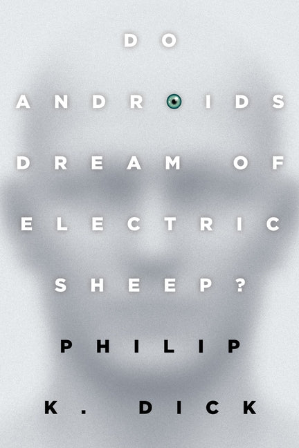 Book cover for 'Do Androids Dream of Electric Sheep?' by Philip K. Dick, featuring a grayscale sheep silhouette with white title text and a small green eye accent.