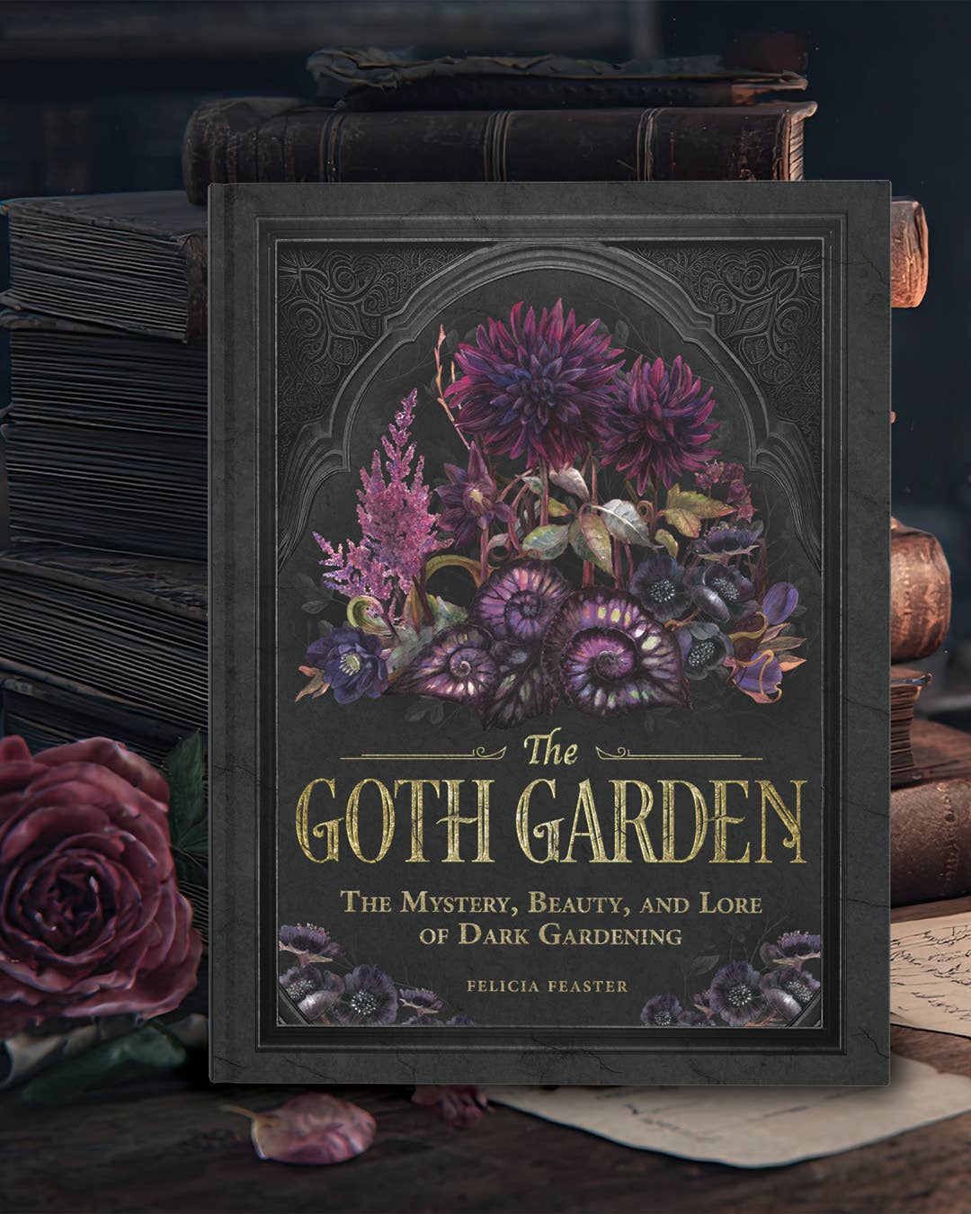 Book titled 'The Goth Garden' with floral design on a dark background